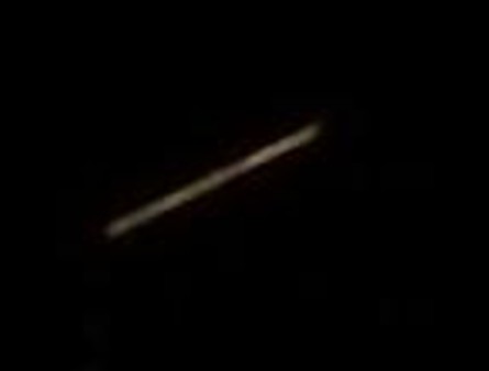 Cropped enlargement of rod-like hovering object