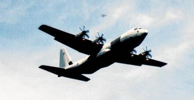 The photographer’s picture showing a mysterious object travelling above a Hercules